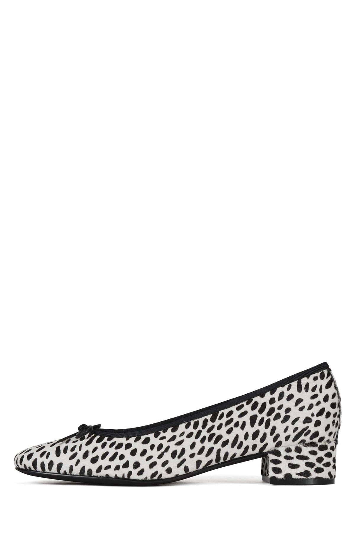 White and black spotted pointed toe pump with a low block heel and small black bow detail